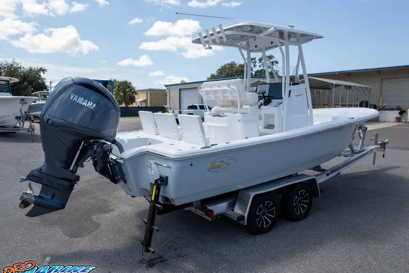 Slide: The Image of 2026 Sea Hunt BX 22 BR boat on trailer with Yamaha outboard motor. - 17