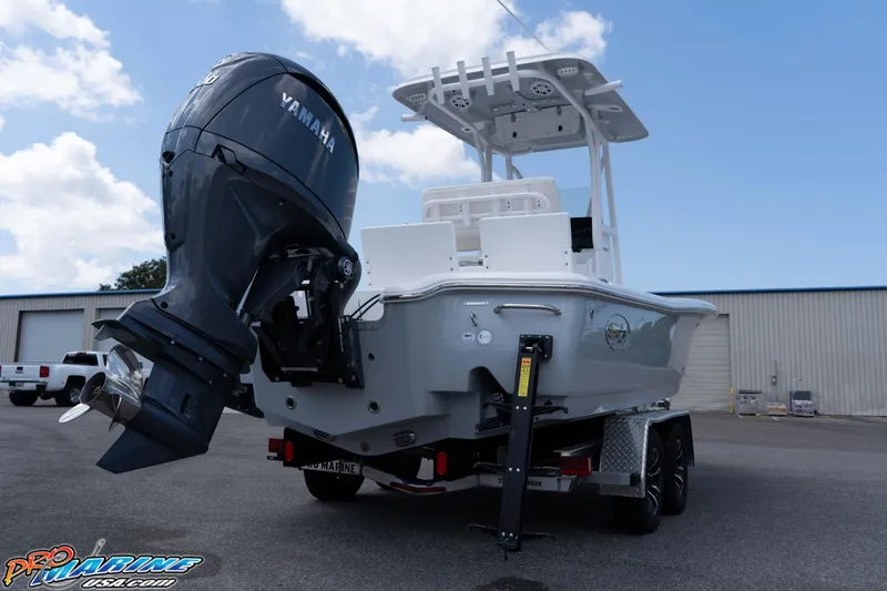 Slide: The Image of 2026 Sea Hunt BX 22 BR boat with Yamaha outboard motor on trailer. - 22
