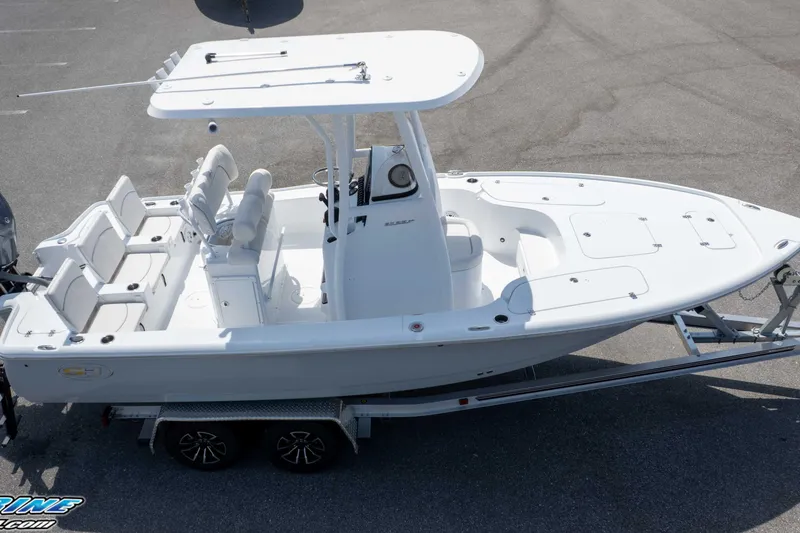 Slide: The Image of 2026 Sea Hunt BX 22 BR boat on trailer, top view, white exterior. - 25