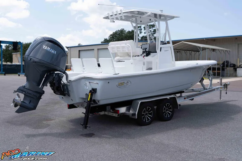 Slide: The Image of 2026 Sea Hunt BX 22 BR boat on trailer with Yamaha outboard motor. - 26