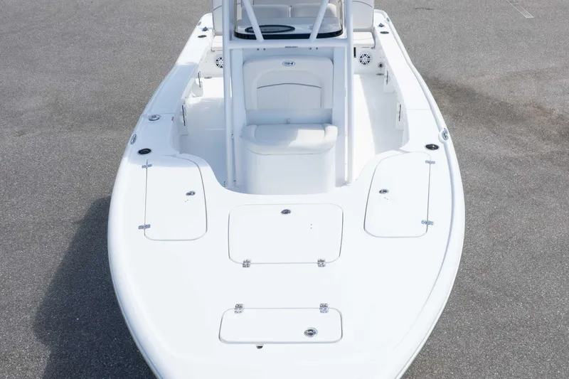 Slide: The Image of 2026 Sea Hunt BX 22 BR boat, top view, showcasing sleek white deck design. - 35