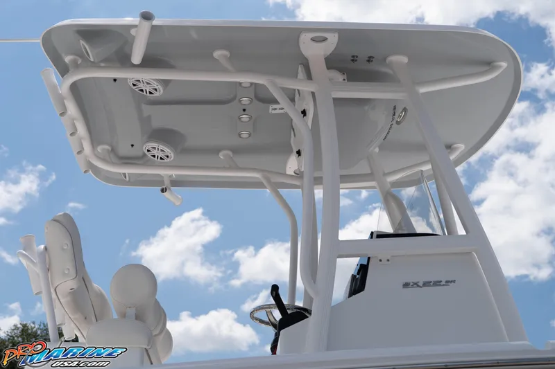 Slide: The Image of 2026 Sea Hunt BX 22 BR boat with T-top against a cloudy sky. - 36