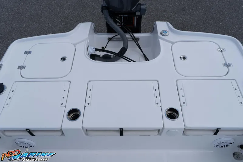 Slide: The Image of 2026 Sea Hunt BX 22 BR boat deck with storage compartments and cup holders. - 42