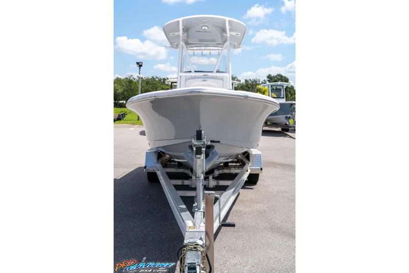 Slide: The Image of 2026 Sea Hunt BX 22 BR boat on trailer, parked outdoors under a clear sky. - 6
