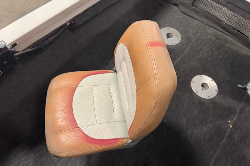 Slide: The Image of 1993 Yar-Craft 1890 CRS boat seat with tan and white upholstery. - 11