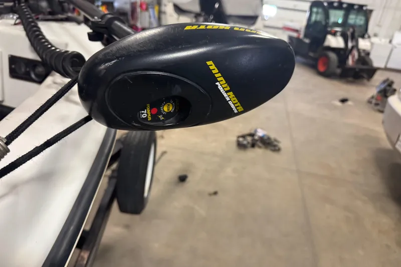 Slide: The Image of Minn Kota PowerDrive trolling motor on 1993 Yar-Craft 1890 CRS boat in garage. - 17