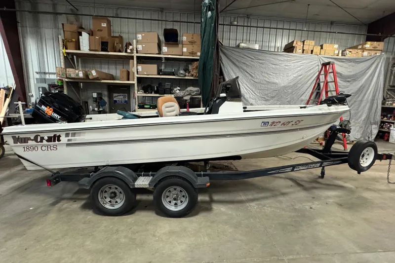 Slide: The Image of 1993 Yar-Craft 1890 CRS boat on trailer in a storage facility. - 3
