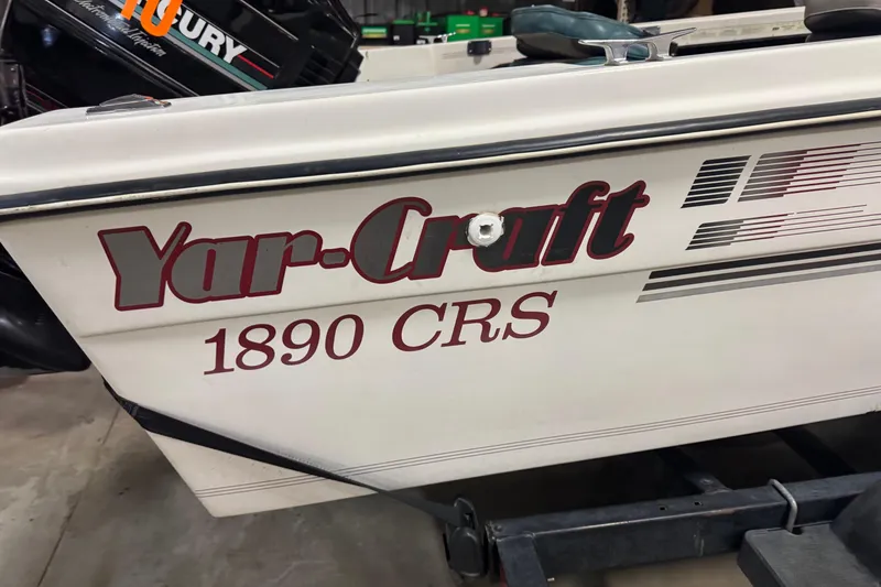 Slide: The Image of 1993 Yar-Craft 1890 CRS boat with visible branding and design details. - 7