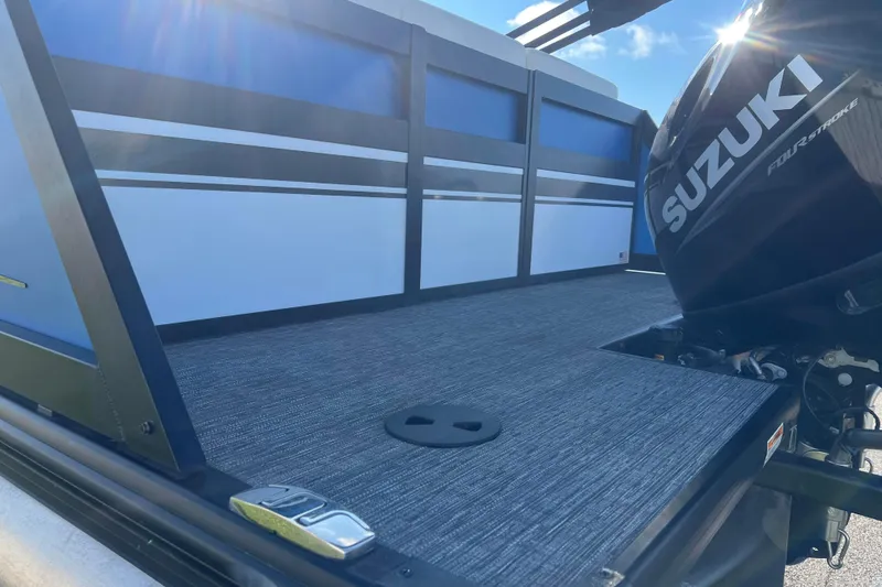 Slide: The Image of 2022 Viaggio Diamante Q boat deck with Suzuki outboard motor in sunlight. - 13