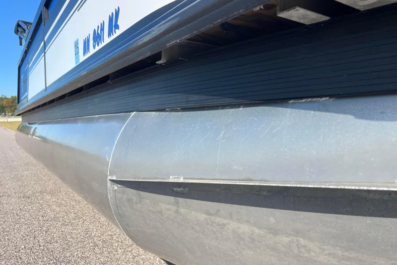 Slide: The Image of 2022 Viaggio Diamante Q pontoon boat side view, showcasing sleek aluminum design. - 22