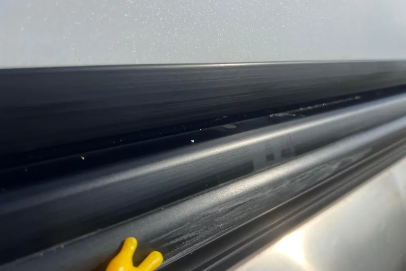 Slide: The Image of Close-up of Viaggio Diamante Q 2022 car detailing with yellow accent. - 23