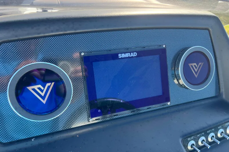 Slide: The Image of Dashboard of 2022 Viaggio Diamante Q with Simrad display and logo. - 25
