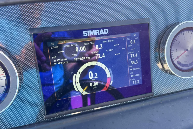 Slide: The Image of Simrad display on 2022 Viaggio Diamante Q dashboard showing navigation and engine data. - 28