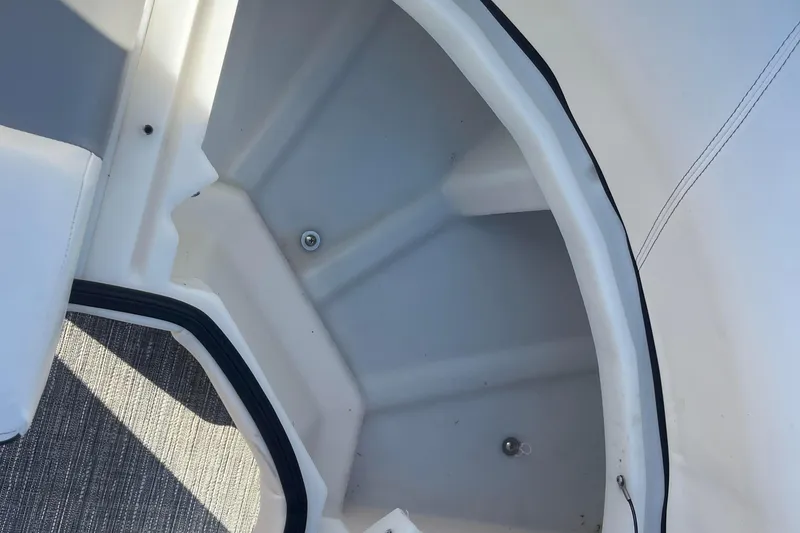 Slide: The Image of Interior view of 2022 Viaggio Diamante Q boat, showcasing storage compartment and seating area. - 34