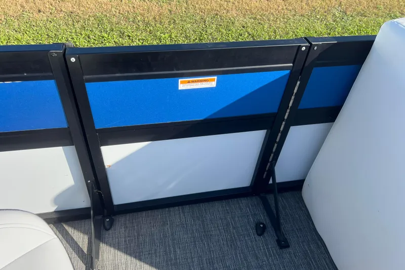 Slide: The Image of Interior view of 2022 Viaggio Diamante Q boat with blue and black paneling. - 38