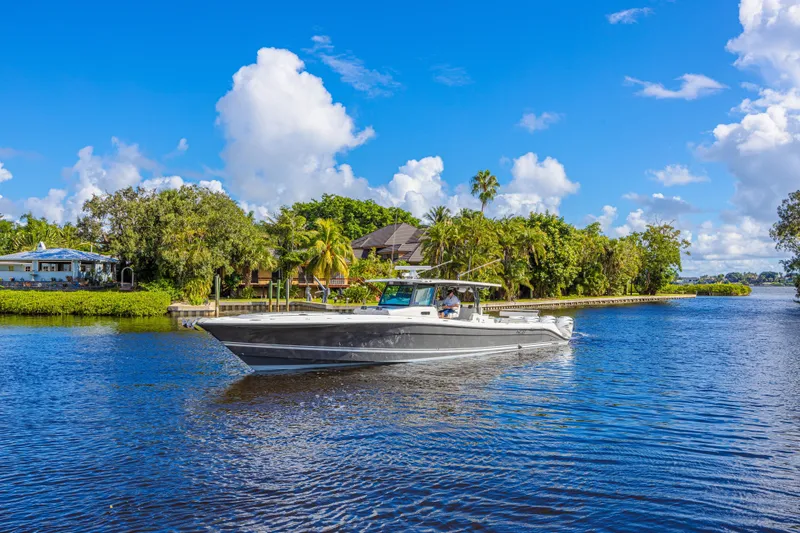 The Image of 2019 HCB 53 Sueños boat cruising on a scenic, tropical waterway. - 0