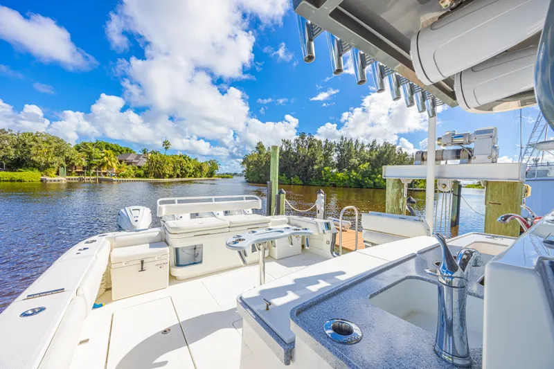 Slide: The Image of 2019 HCB 53 Sueños boat interior with scenic river view and blue sky. - 10