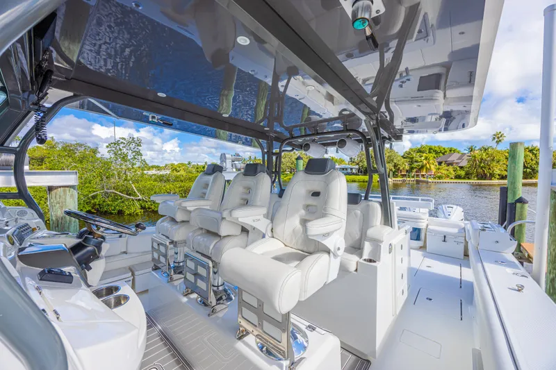 Slide: The Image of Luxurious 2019 HCB 53 Sueños boat interior with plush seating and sleek design. - 14