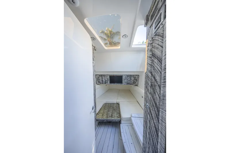 Slide: The Image of Interior cabin of 2019 HCB 53 Sueños boat with skylight and modern design. - 25