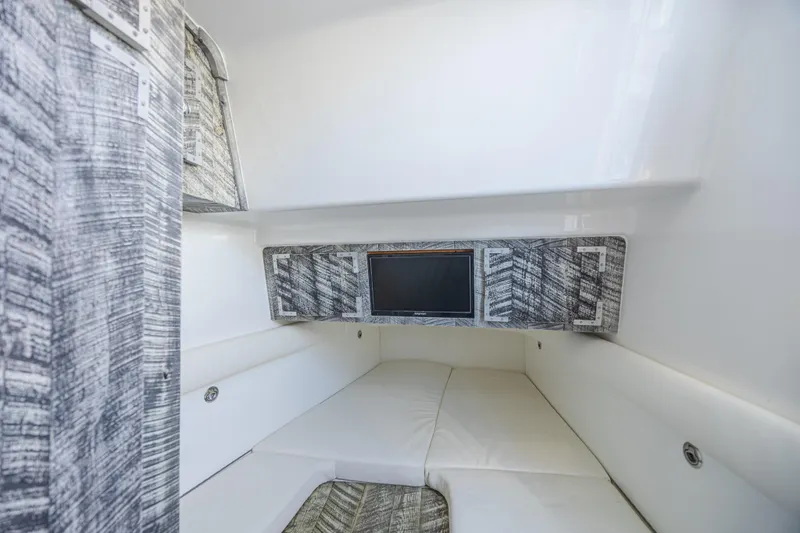 Slide: The Image of Interior cabin of 2019 HCB 53 Sueños boat with modern design and TV. - 27