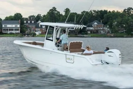 Slide: The Image of 2024 Sea Hunt Ultra 255 SE boat console with electronics and controls. - 15