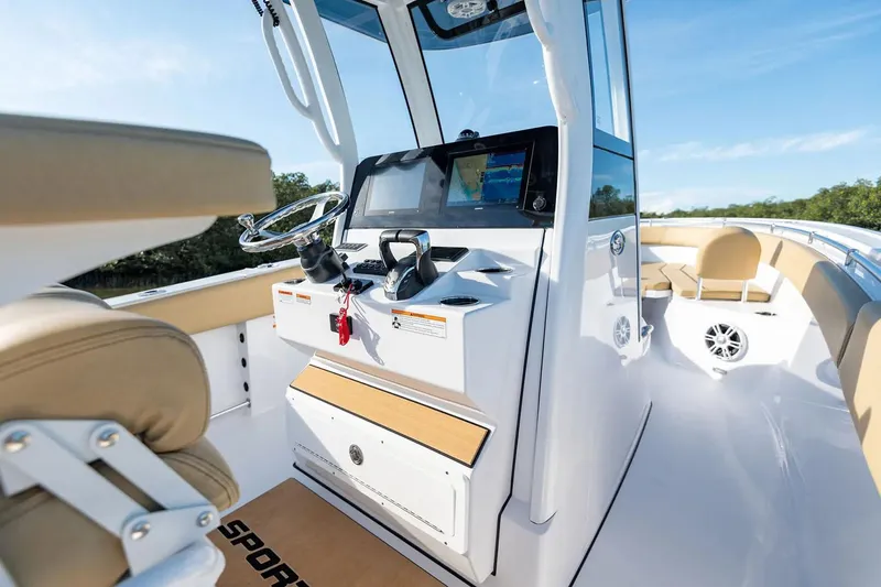 Slide: The Image of Manufacturer Provided Image: 2025 Sportsman Open 252 Center Console boat interior with modern controls and seating. - 6