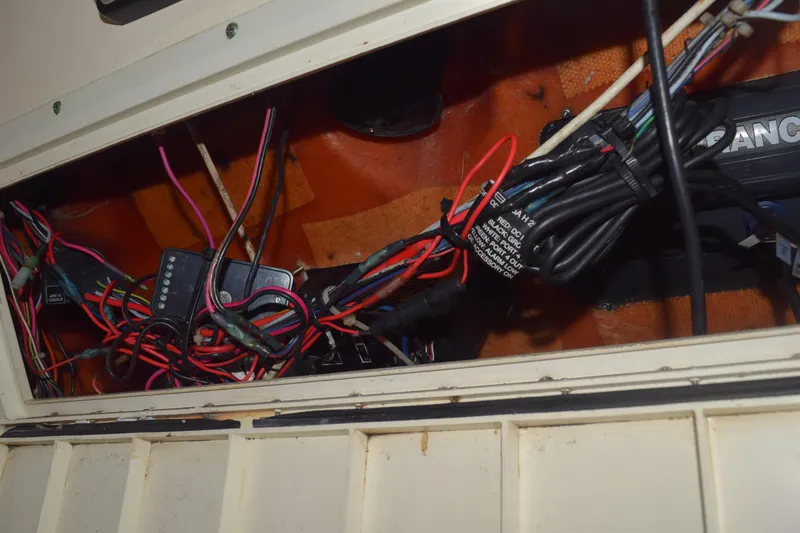 Slide: The Image of Lowrance Elite-7 HDI fishfinder on 2003 Scout 242 Sportfish boat dashboard. - 104