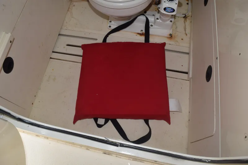 Slide: The Image of Black Fusion device on a 2003 Scout 242 Sportfish boat dashboard. - 105