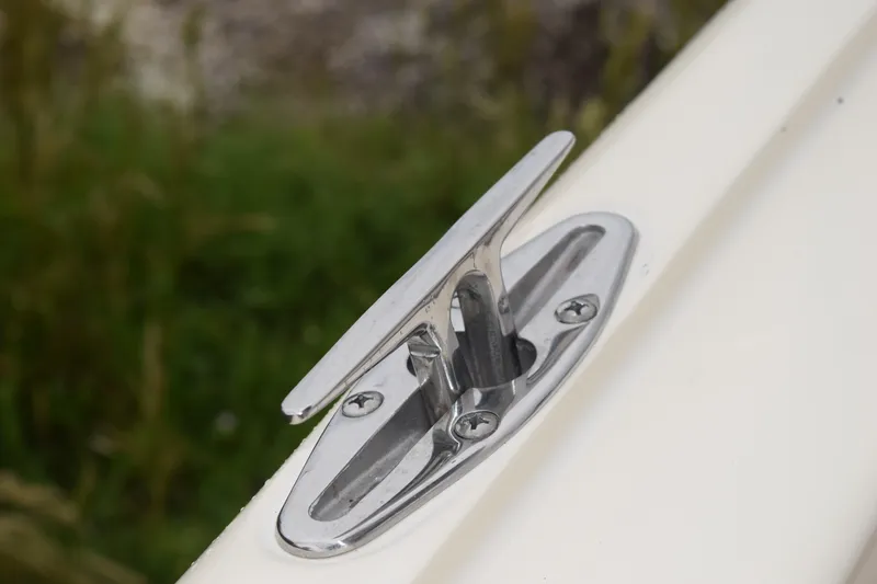 Slide: The Image of Cup holder on a 2003 Scout 242 Sportfish boat console. - 107