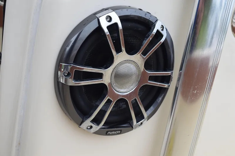 Slide: The Image of 2003 Scout 242 Sportfish boat dashboard with controls and navigation equipment. - 113