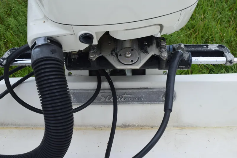 Slide: The Image of Brown leather seat with "Scout" logo on a 2003 Scout 242 Sportfish boat. - 119