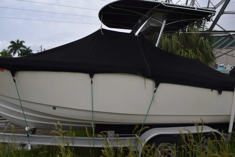 Slide: The Image of Coiled rope and chain in 2003 Scout 242 Sportfish boat compartment. - 17