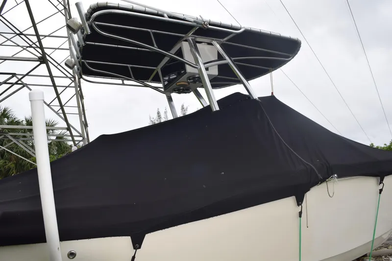 Slide: The Image of 2003 Scout 242 Sportfish boat interior with toilet and fire extinguisher. - 29