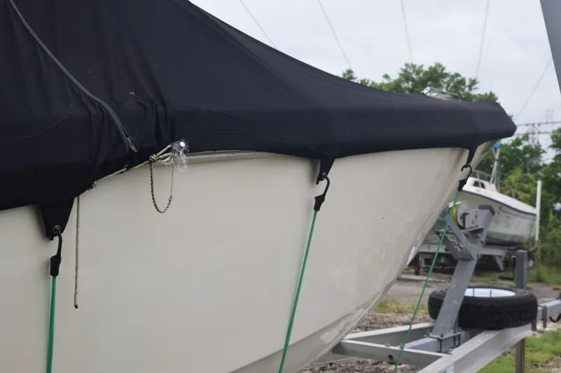 Slide: The Image of Porthole view inside 2003 Scout 242 Sportfish boat cabin. - 31