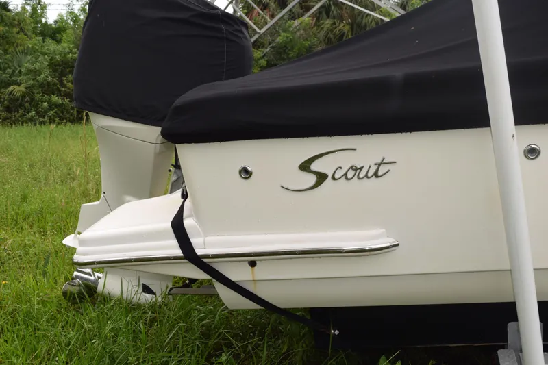 Slide: The Image of Fire extinguisher mounted on 2003 Scout 242 Sportfish boat interior. - 33