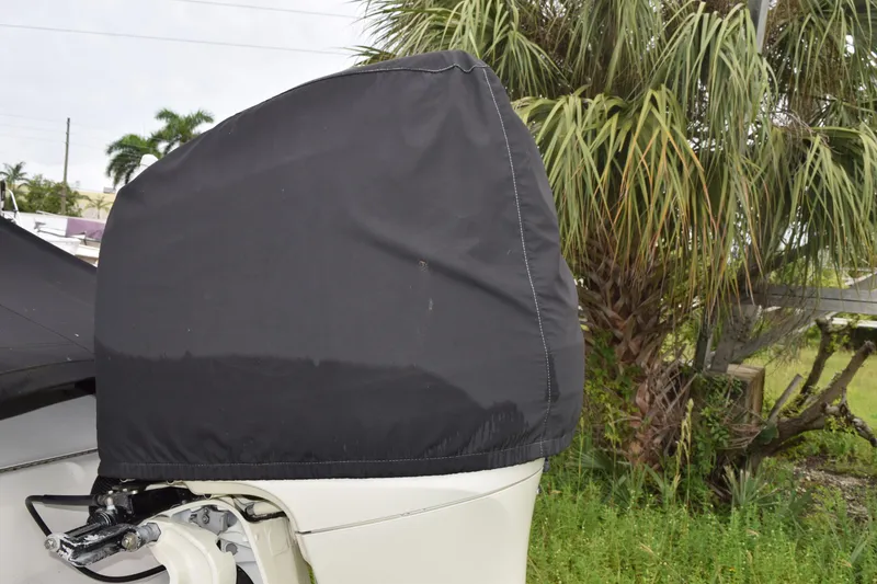 Slide: The Image of Interior of 2003 Scout 242 Sportfish boat showing storage compartment and equipment. - 35