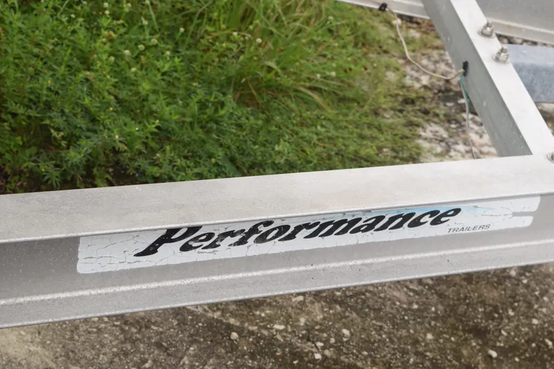 Slide: The Image of 2003 Scout 242 Sportfish electrical panel with Fusion amplifier and Lewmar switches. - 41