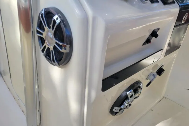 Slide: The Image of Close-up of a 2003 Scout 242 Sportfish boat anchor under a metal structure. - 5