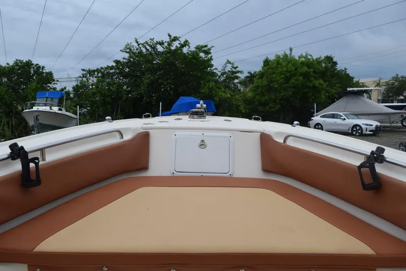 Slide: The Image of Close-up of a 2003 Scout 242 Sportfish boat emblem. - 60