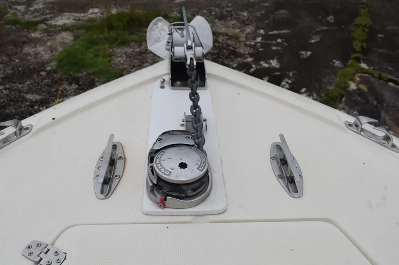 Slide: The Image of 2003 Scout 242 Sportfish storage compartment with drawers and water control valve. - 71