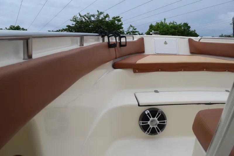 Slide: The Image of 2003 Scout 242 Sportfish storage compartment with open drawers and tackle boxes. - 76