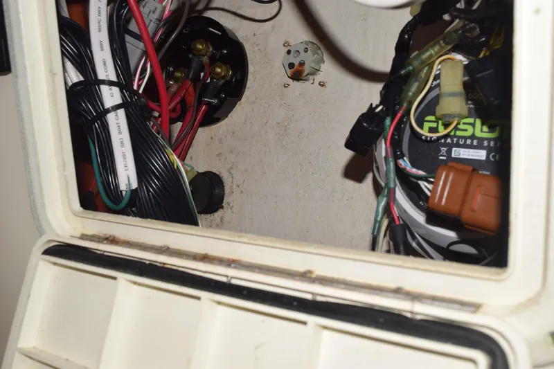 Slide: The Image of Close-up of a 2003 Scout 242 Sportfish boat ceiling light fixture. - 93