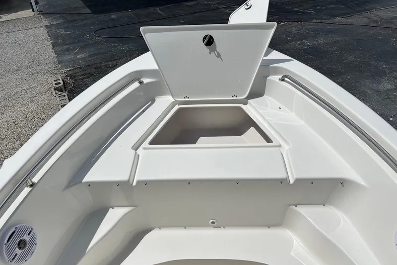 Slide: The Image of 2026 Key West 189 FS boat interior with open storage compartment. - 15