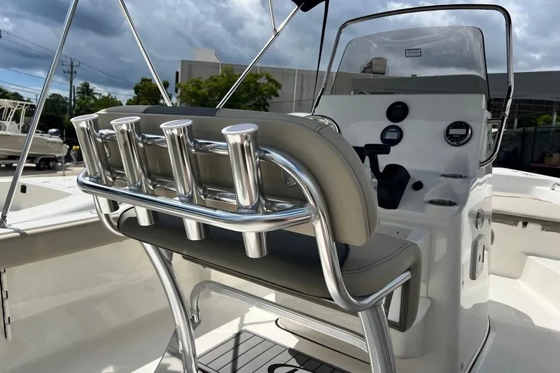 Slide: The Image of 2026 Key West 189 FS boat interior with rod holders and control panel. - 20