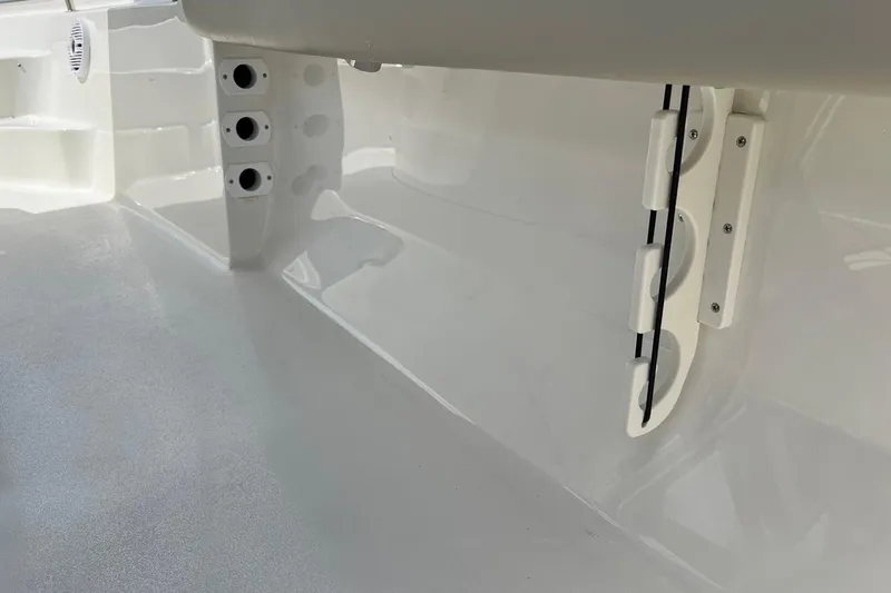 Slide: The Image of Interior view of 2026 Key West 189 FS boat, showcasing rod holders and sleek design. - 22