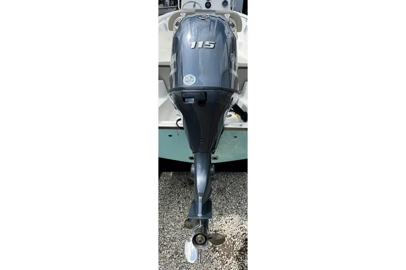 Slide: The Image of 2026 Key West 189 FS boat with 115 horsepower outboard motor, rear view. - 6