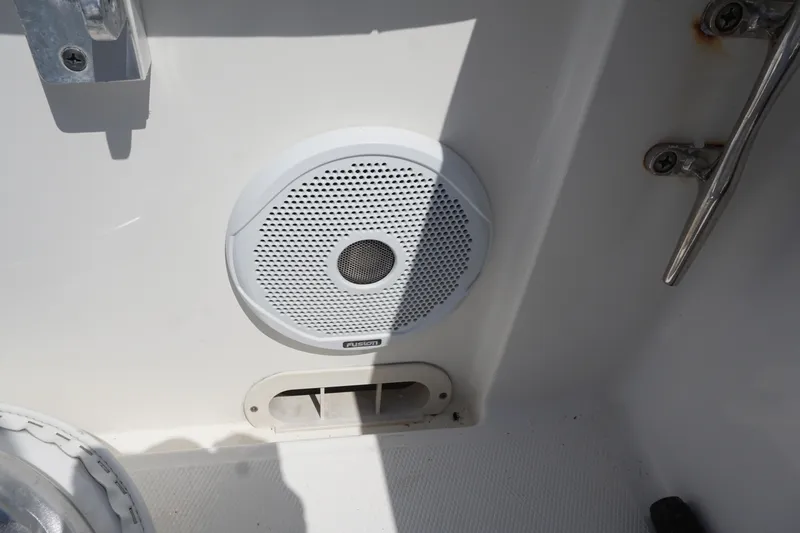 Slide: The Image of White speaker on 2012 Regulator 32 Forward Seating boat interior. - 19