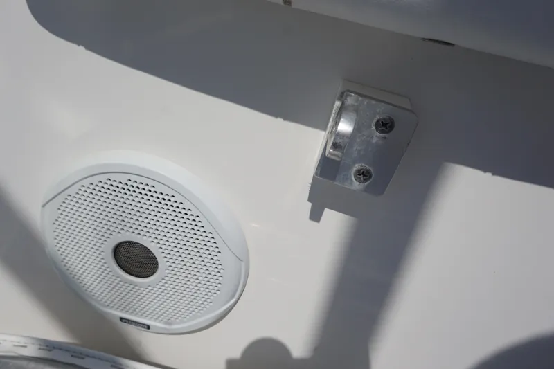 Slide: The Image of 2012 Regulator 32 Forward Seating boat speaker and metal bracket detail. - 21