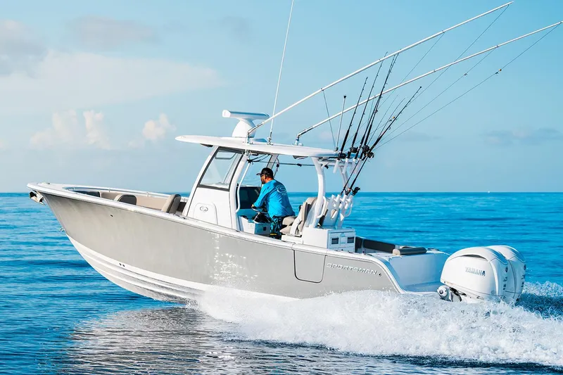 Slide: The Image of Manufacturer Provided Image: 2025 Sportsman Open 282 Center Console boat cruising on open water. - 3