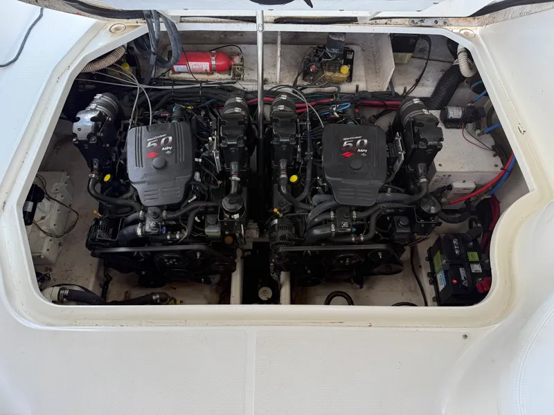Slide: The Image of Engine compartment of a 2007 Sea Ray 290 Sundancer with twin MerCruiser engines. - 16